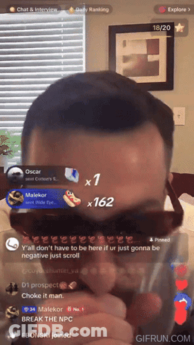 Man Wearing Sunglasses Live Streaming GIF