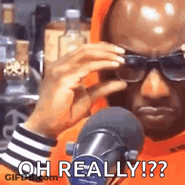 Man Wearing Sunglasses Making Funny Face GIF