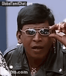 Man Wearing Sunglasses Making Funny Face GIF