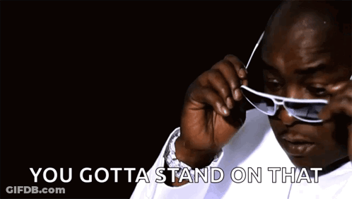 Man Wearing Sunglasses Saying You Gotta Stand On That GIF
