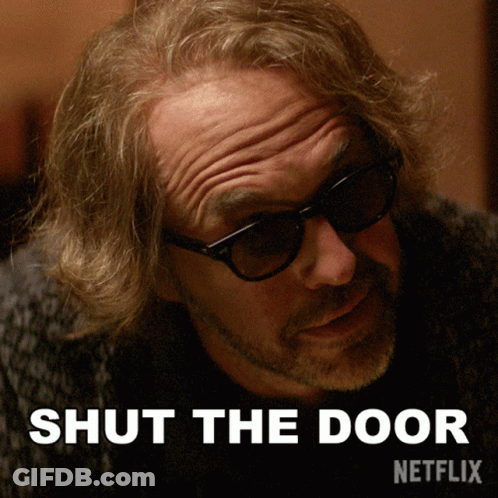 Man Wearing Sunglasses Shut The Door GIF