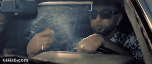 Man Wearing Sunglasses Smoking Cigarette GIF