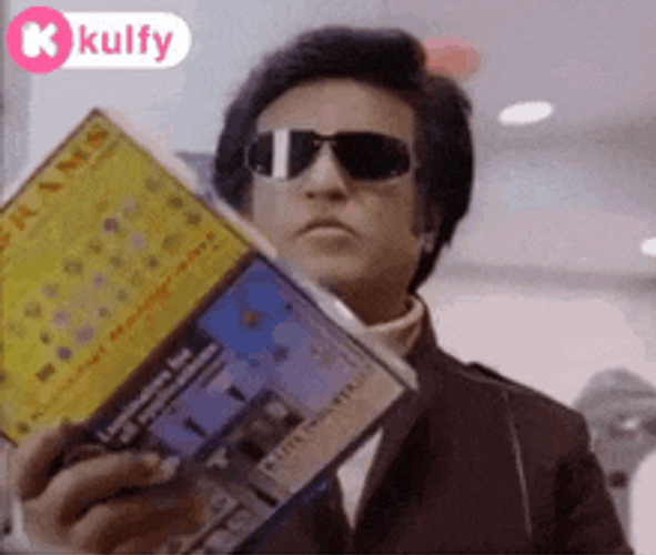 Man Wearing Sunglasses Swaying Book Reading GIF