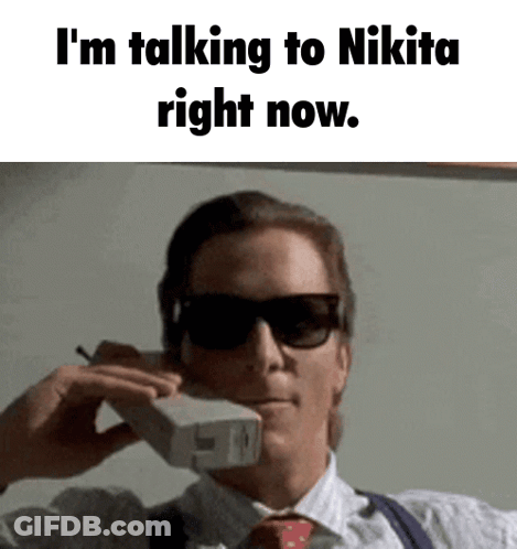 Man Wearing Sunglasses Talking On Phone GIF