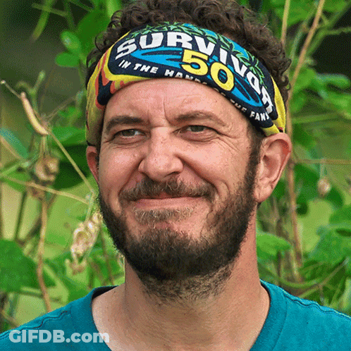 Man Wearing Survivor Headband In Jungle GIF