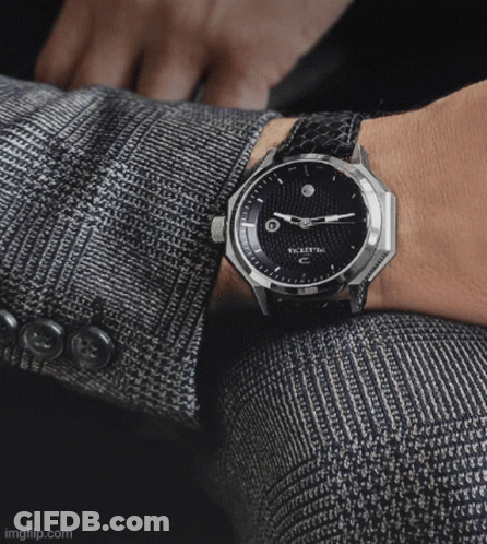 Man Wearing T.K.E.I.T.E.C. Watch GIF