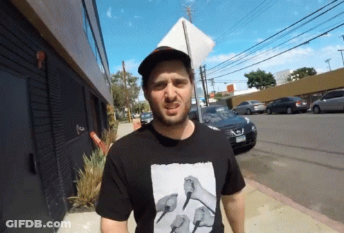 Man Wearing T-Shirt With Knives GIF
