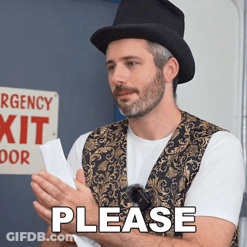 Man Wearing Top Hat Holding Paper In Front Of Emergency Exit Sign GIF