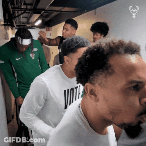 Man Wearing Vote Shirt GIF