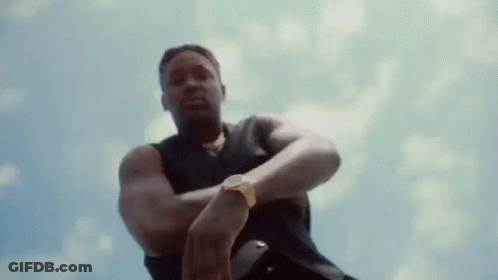 Man Wearing Watch In Cloudy Sky GIF