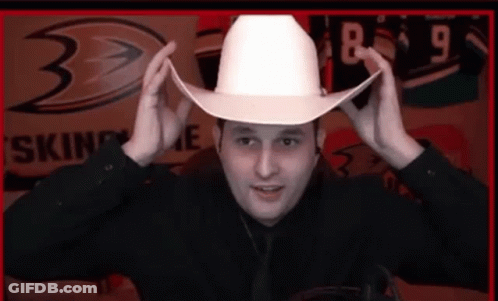 Man Wearing White Cowboy Hat With 8 GIF