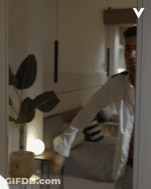 Man Wearing White Polo Getting Ready GIF