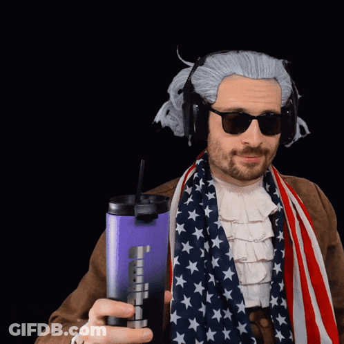 Man Wearing Wig And Sunglasses Holding Purple Container With A GIF