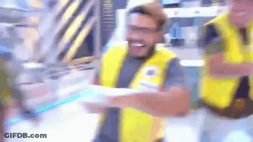 Man Wearing Yellow Vest With Letter O GIF