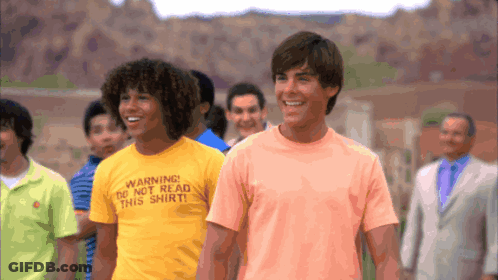 Man Wearing Yellow Warning Do Not Read This Shirt GIF