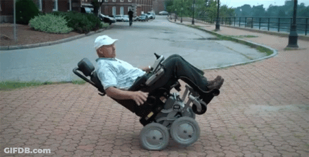 Man Wheelchair Trick GIF