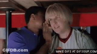 Man Whispering Into Another Man's Ear GIF