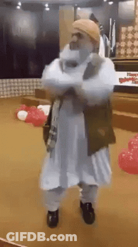 Man White Robe Crossed Arms Red White Balloons GIF