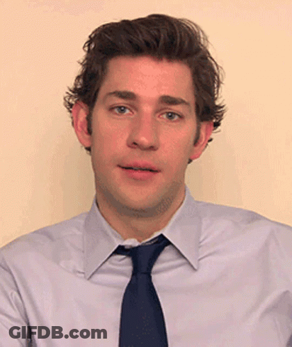 Man White Shirt Blue Tie Looking At Camera GIF