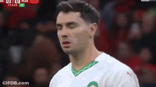 Man White Shirt Green Stripe Downward Eyes Closed GIF