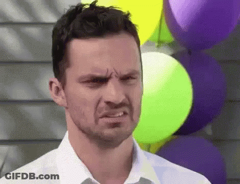 Man White Shirt Tie Making Face Balloons GIF
