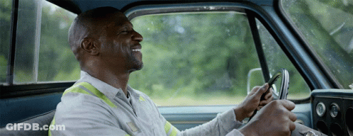 Man White Shirt Yellow Vest Driving Blue Truck GIF