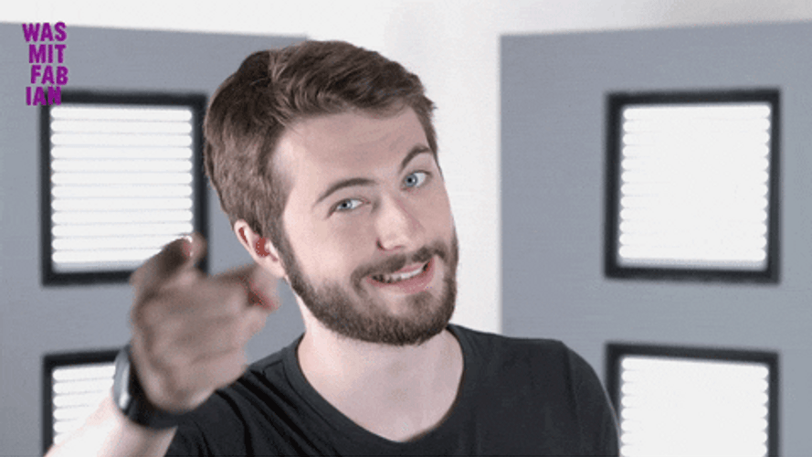 Man Wink And Pointing GIF
