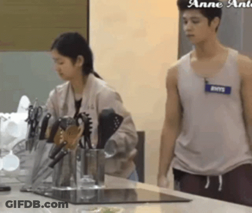 Man With Anns Name Tag Next To Woman GIF