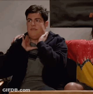 Man With Arm Around Another Man At Table GIF