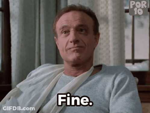 Man With Arm Bandage Sitting Says Fine GIF