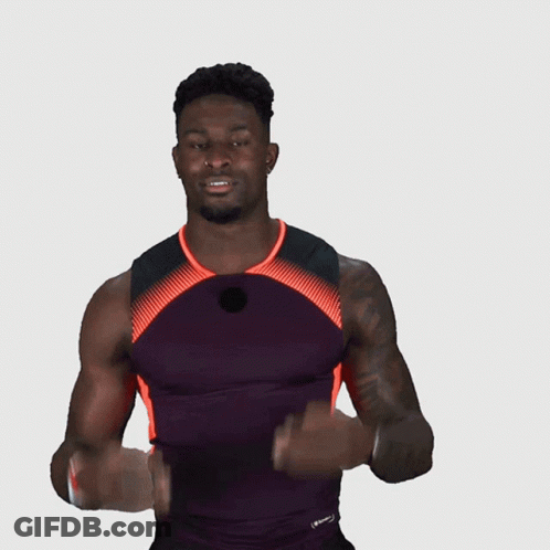 Man With Arm Tattoo In Purple Shirt GIF