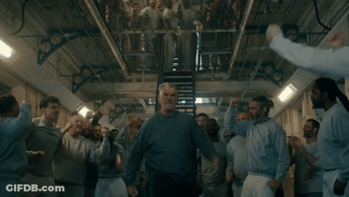Man With Arm Tattoo Sitting At Computer Desk GIF