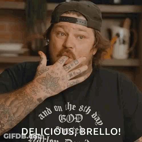 Man With Arm Tattoo Wearing Black Shirt That Says And On The 8Th Day God GIF