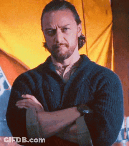 Man With Arms Crossed In Black Sweater GIF