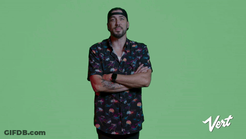 Man With Arms Crossed In Front Of Green Background Saying Packaging That's As Unique As You Are GIF