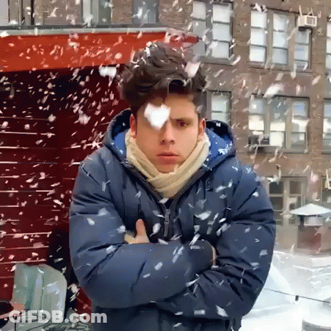 Man With Arms Crossed In Snow GIF