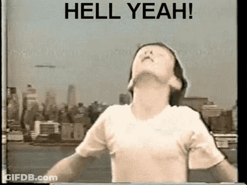 Man With Arms Outstretched And Hell Yeah Sign GIF