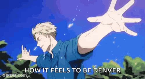 Man With Arms Outstretched In Blue Sky GIF