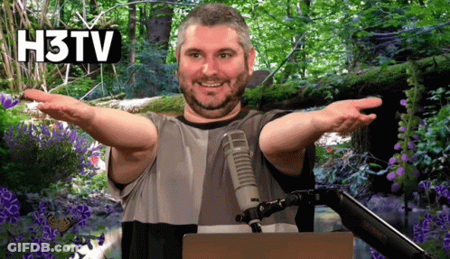 Man With Arms Outstretched In Front Of Microphone With H3TV GIF