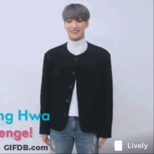 Man With Arms Outstretched In Front Of Wall GIF