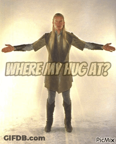 Man With Arms Outstretched Saying Where My Hug At GIF