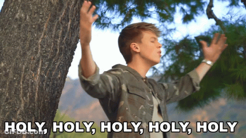 Man With Arms Outstretched Says Holy Holy Holy GIF