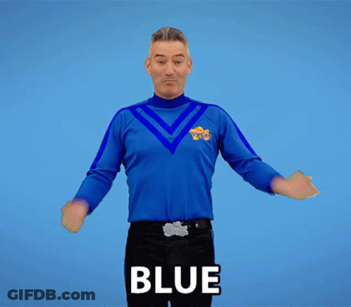 Man With Arms Outstretched Wearing Blue Shirt Saying Blue GIF