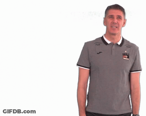 Man With Arms Outstretched Wearing Fila Shirt GIF