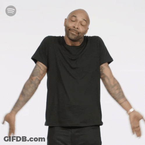 Man With Arms Outstretched Wearing Spotify Logo GIF