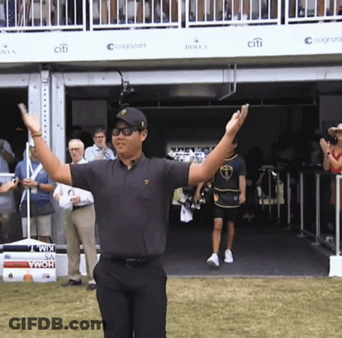 Man With Arms Raised At Citi Sign GIF