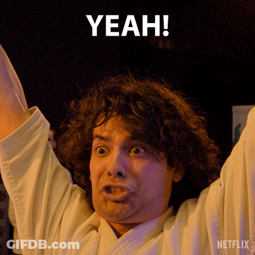 Man With Arms Up And Netflix Logo GIF