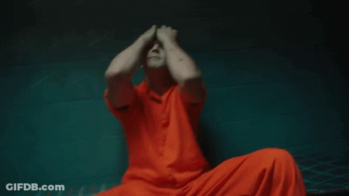 Man With Arrow Tattoo Covering Face GIF
