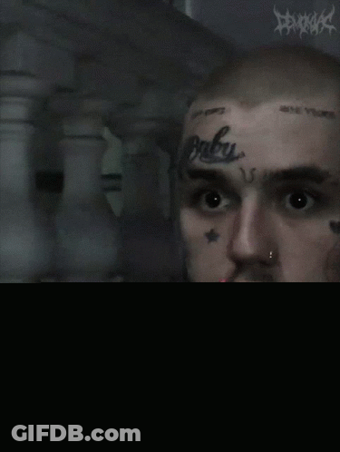 Man With Baby Tattoo Smoking Cigarette GIF