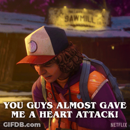 Man With Backpack In Front Of Sawmill Sign GIF